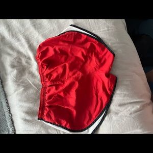 Red Nike running shorts
